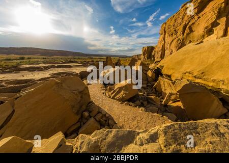 In 1941, Threatening Rock collapsed onto part of Pueblo Bonito, destroying some of the cultural ruins in Chaco Culture National Historical Park, New M Stock Photo