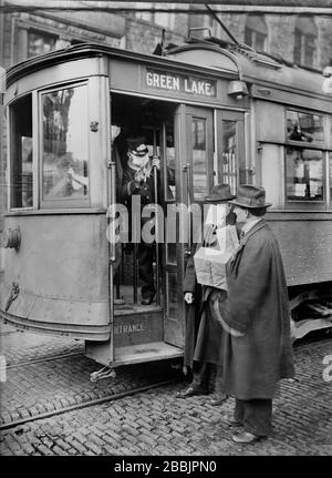 Precautions taken during Spanish Influenza Epidemic would not permit anyone to ride on Street Cars with wearing a Mask, 260,000 of these were made by Seattle Chapter of Red Cross, which consisted of 120 Workers in Three Days, Seattle, Washington, USA, American National Red Cross Photograph Collection, October 1918