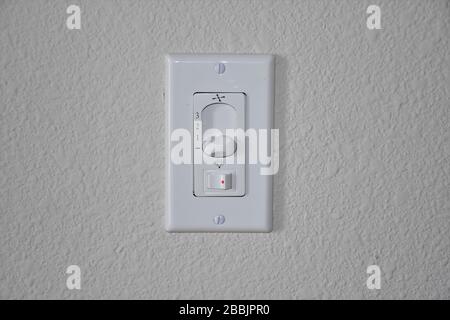 3 Speed White Wall Mount Universal Ceiling Fan Remote Control Stock Photo