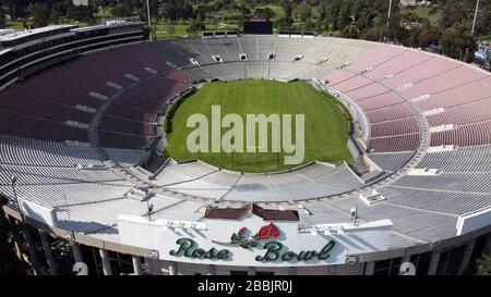 An aerial view of the Rose Bowl Stadium football field with the logos ...