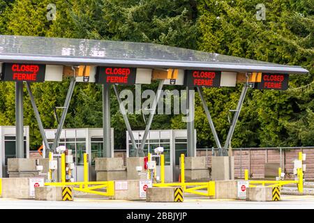 Surrey, Canada - March 29, 2020: Empty inspection stations at closed Peace Arch Canadian border entrance during Coronavirus Covid-19 outbreak
