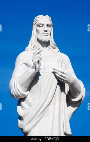 HAVANA, CUBA - MARCH 30, 2017: Marble statue of Christ of Havana with blue sky. Casa Blanca, Regla, Cuba Stock Photo