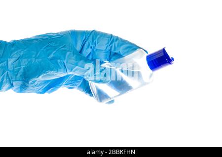 Close up of hand with medical gloves and sanitizer, desinfection against coronavirus, protection against virus Stock Photo