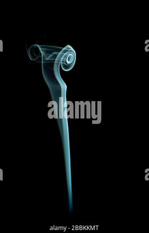 colored smoke shapes with black background Stock Photo