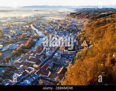 Old town Wolfratshausen with Loisach and mountain forest in winter, drone shot, alpine chain, foothills of the Alps, Upper Bavaria, Bavaria, Germany Stock Photo