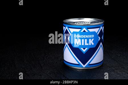 Condensed milk can on black background Stock Photo