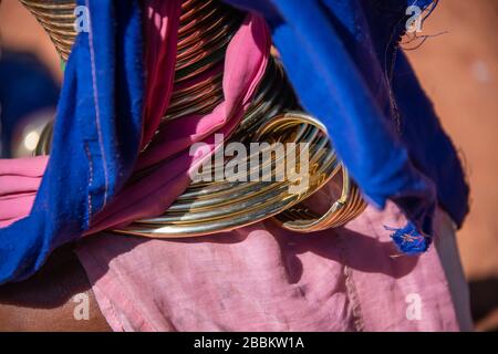 Pan Pet, Kayah State: Close up of the traditional brass neck rings worn by a Kayan longneck woman from the Padaung tribe in Northern Myanmar Stock Photo