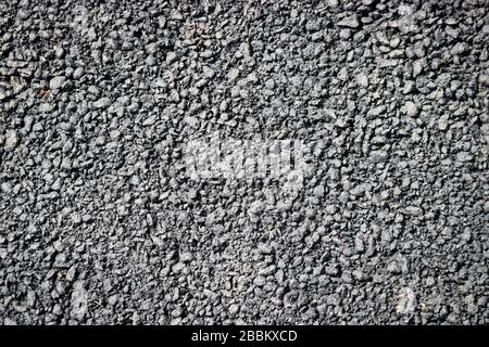 The surface of fresh black asphalt on the road in detail. Stock Photo