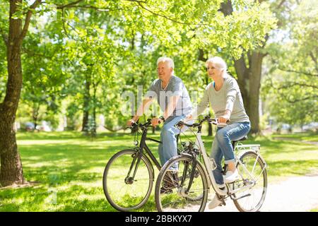 Senior couple on bicycles Stock Photo