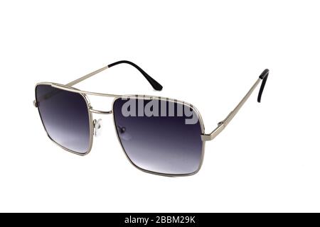 Black pilot aviator sunglasses with gold rimmed isolated white background, side view Stock Photo