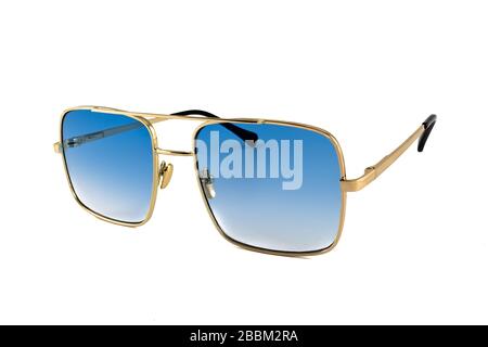 Blue pilot aviator sunglasses with golden rimmed isolated white background, side view Stock Photo