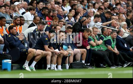 Aston Villa's assistant manager John Terry (centre) in the dugout Stock Photo
