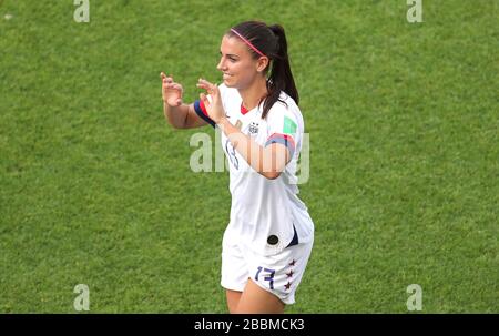 USA's Alex Morgan celebrates after the final whistle Stock Photo