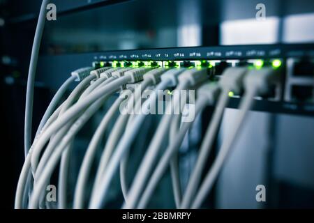 Network server room with servers, high performance computers running processes Stock Photo