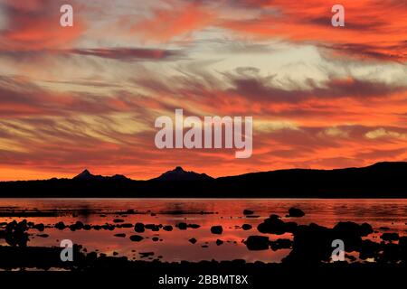 Sunset over the Gulf of Admiral Montt, Puerto Natales city, Patagonia, Chile, South America Stock Photo