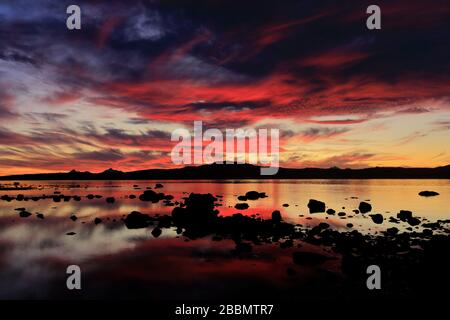 Sunset over the Gulf of Admiral Montt, Puerto Natales city, Patagonia, Chile, South America Stock Photo