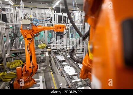 Automatic robots in the industrial factory for assembly automotive products, automotive concept Stock Photo