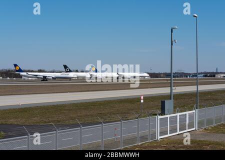 lufthansa planes park  due to the Corona, Covid 19 shutdownon the northwest runway of Frankfurt Airport, FRA, Germany Stock Photo