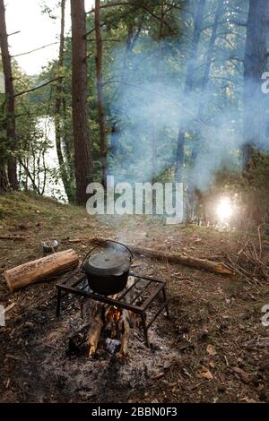 Smoked Tourist Kettle On Camp Fire Stock Photo, Picture and Royalty Free  Image. Image 29670609.