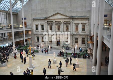 NEW YORK CITY - OCTOBER 22, 2014: People visit Metropolitan Museum of Art.The Charles Engelhard Court in American Wing Stock Photo