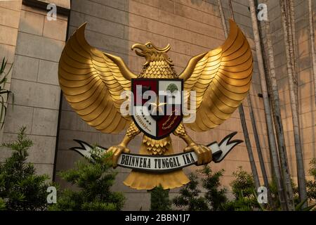 Jakarta, Indonesia - July 13, 2019: The mythological being Garuda, holds the shield and symbol of Indonesia, in the Cathedral of Jakarta. Stock Photo