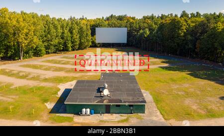 The snack bar sound poles and projection screen still stand at this old Drive In Stock Photo