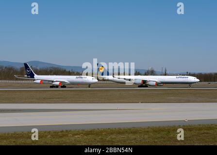 lufthansa planes park  due to the Coronavirus, Covid 19 shutdownon the northwest runway of Frankfurt Airport, FRA, Germany Stock Photo