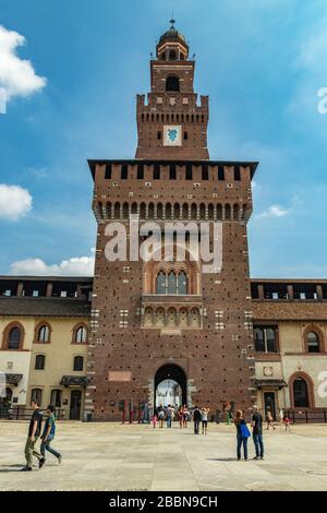 MILAN, ITALY - Aug 1, 2019: People visiting the Sforza Castle XV century - Castello Sforzesco. It is one of the main symbols of the city of Milan, Lom Stock Photo