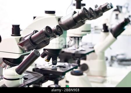 Optical microscopes in the store at the exhibition Stock Photo