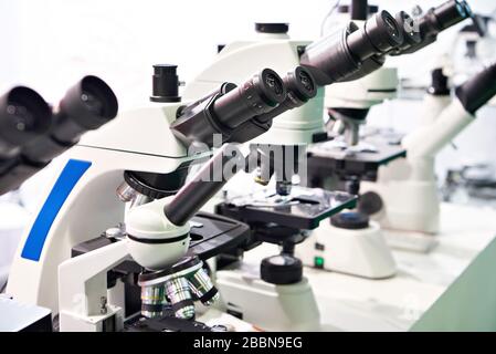 Optical microscopes in the store at the exhibition Stock Photo
