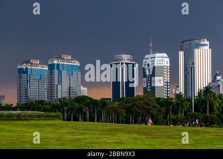 The Jakarta Skyline From The National Monument Park, Jakarta, Indonesia. Stock Photo