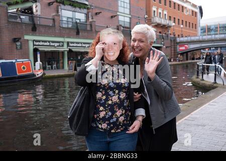 Women out celebrating a friend and her 50th birthday party out on Broad Street on 14th March 2020 in Birmingham, United Kingdom. Broad Street is a popular area in Birminham for groups of men and women to celebrate in large groups. Stock Photo