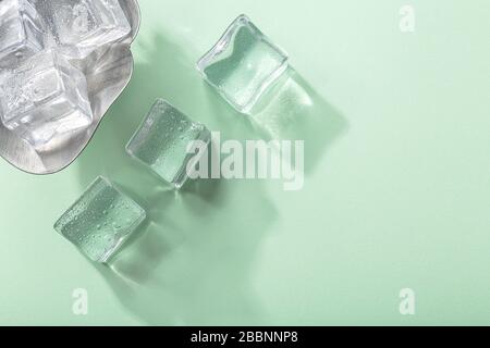 Colored banner with fresh ice cubes and reflections Stock Photo