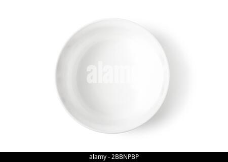 Deep white porcelain dish isolated on white. View from above Stock Photo