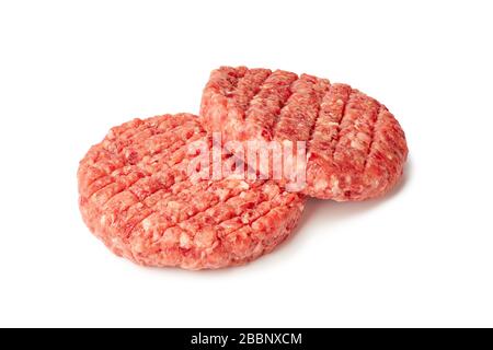 Two raw burger patties on white Stock Photo
