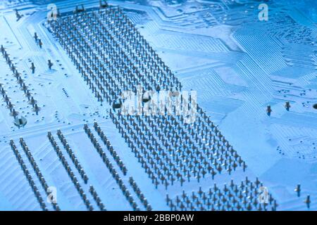 Blue electronic circuit board of an electronic device close-up background Stock Photo