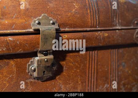 Close up of old vintage metal luggage trunk Stock Photo