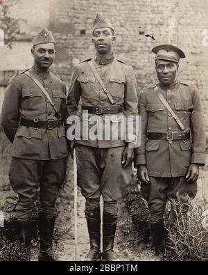 Officers of the 2nd Battalion, 372nd Infantry in France: 2nd Lt. Tom Walker (from left), 1st Lt. Ben Rudd and 2nd Lt. William Nichols. The 372nd was a segregated unit that earned the French Croix de Guerre with Palm during the Meuse-Argonne campaign for its heroic actions in battle. April 6 commemorates the 100th anniversary of the U.S. entry into World War I. (Ohio Army National Guard Historical Collections) Stock Photo