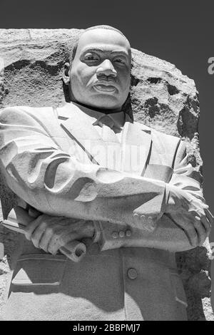With arms folded, Lei Yixin's 9 metre granite statue of Martin Luther King, Jr. looks out over the Tidal Basin from West Potomac Park in Washington DC Stock Photo