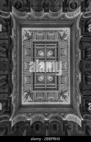 The elaborately decorated ceiling of the Great Hall of the Library of Congress. The scale-pattern of the skylights matches that of the floor below Stock Photo