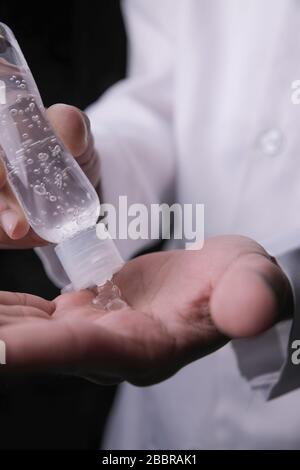 Hand Sanitizing from bacteria Stock Photo