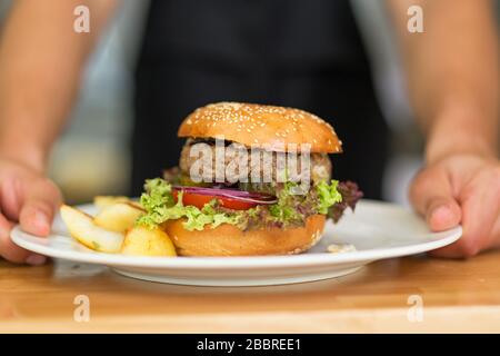 Professional chef in industrial kitchen Stock Photo