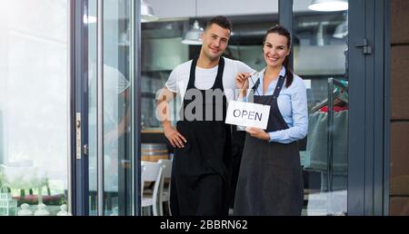 Woman and man working at cafe Stock Photo