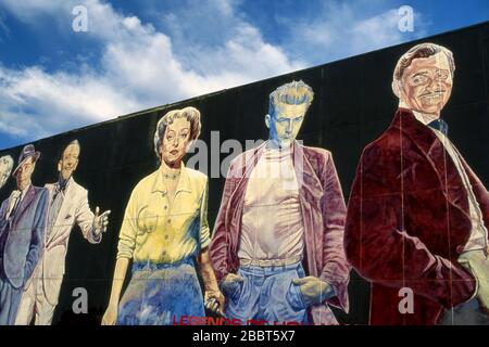 'Legends of Hollywood' mural painted by Eloy Torrez depicts legendary Hollywood movie stars including James Dean, Clark Galble, Bette Davis and others and located in Hollywood, CA Stock Photo