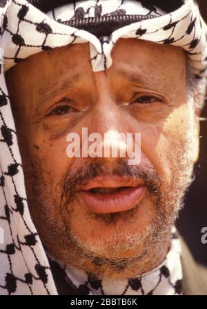 Cairo, Egypt - 15 April 1992 - PLO Chairman Yasser Arafat meets Egyptian President Hosni Mubarak 1 week after Arafat was involved in a near fatal airplane crash in the Libyan desert (see wounds on his face). Stock Photo