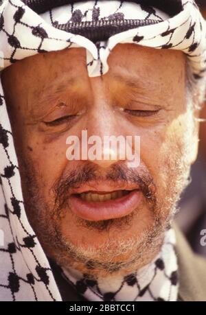 Cairo, Egypt - 15 April 1992 - PLO Chairman Yasser Arafat meets Egyptian President Hosni Mubarak 1 week after Arafat was involved in a near fatal airplane crash in the Libyan desert (see wounds on his face). Stock Photo