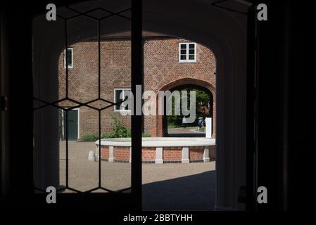 Tudor Courtyard Brickwork Pattern Architectural Details at Entrance to Fulham Palace, Bishop's Avenue, Fulham, London, SW6 6EA Stock Photo