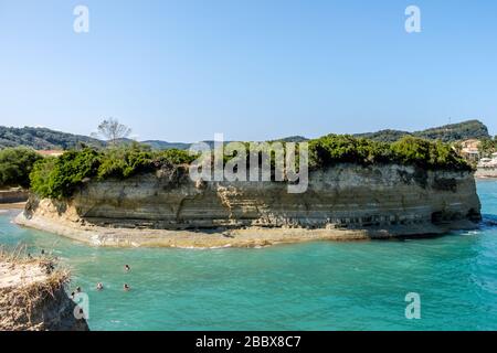 Holidaymakers enjoying the sea at Canal d'Amour in Sidari. One of the most spectacular nature scenes of Corfu Greece. Stock Photo