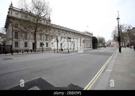 London, UK. 01st Apr, 2020. Day Nine of Lockdown in London. An almost deserted Whitehall at 12.30pm. The country is on lockdown due to the COVID-19 Coronavirus pandemic. People are not allowed to leave home except for minimal food shopping, medical treatment, exercise - once a day, and essential work. COVID-19 Coronavirus lockdown, London, UK, on April 1, 2020 Credit: Paul Marriott/Alamy Live News