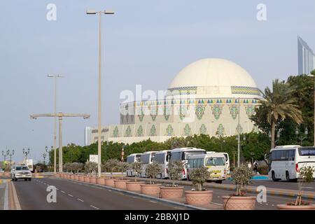 Abu Dhabi, UAE, January 10, 2019: View of the National Theatre in Abu Dhabi and many buses with tourists Stock Photo